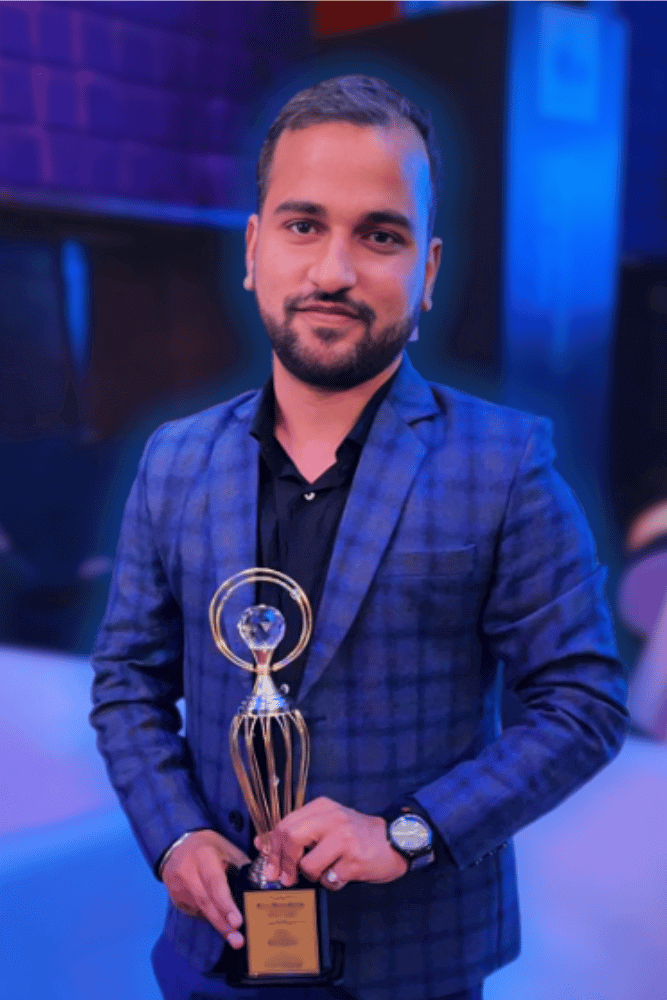 Hari Narayan Sirothiya, Founder of Tangible Spaces, holding an award