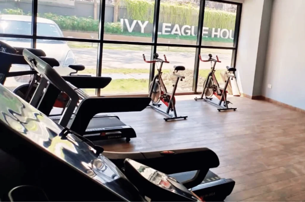 Student gym and fitness centre at Ivy League House Pune with modern equipment